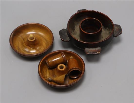 A treen flea trap and and an olivewood candlestick